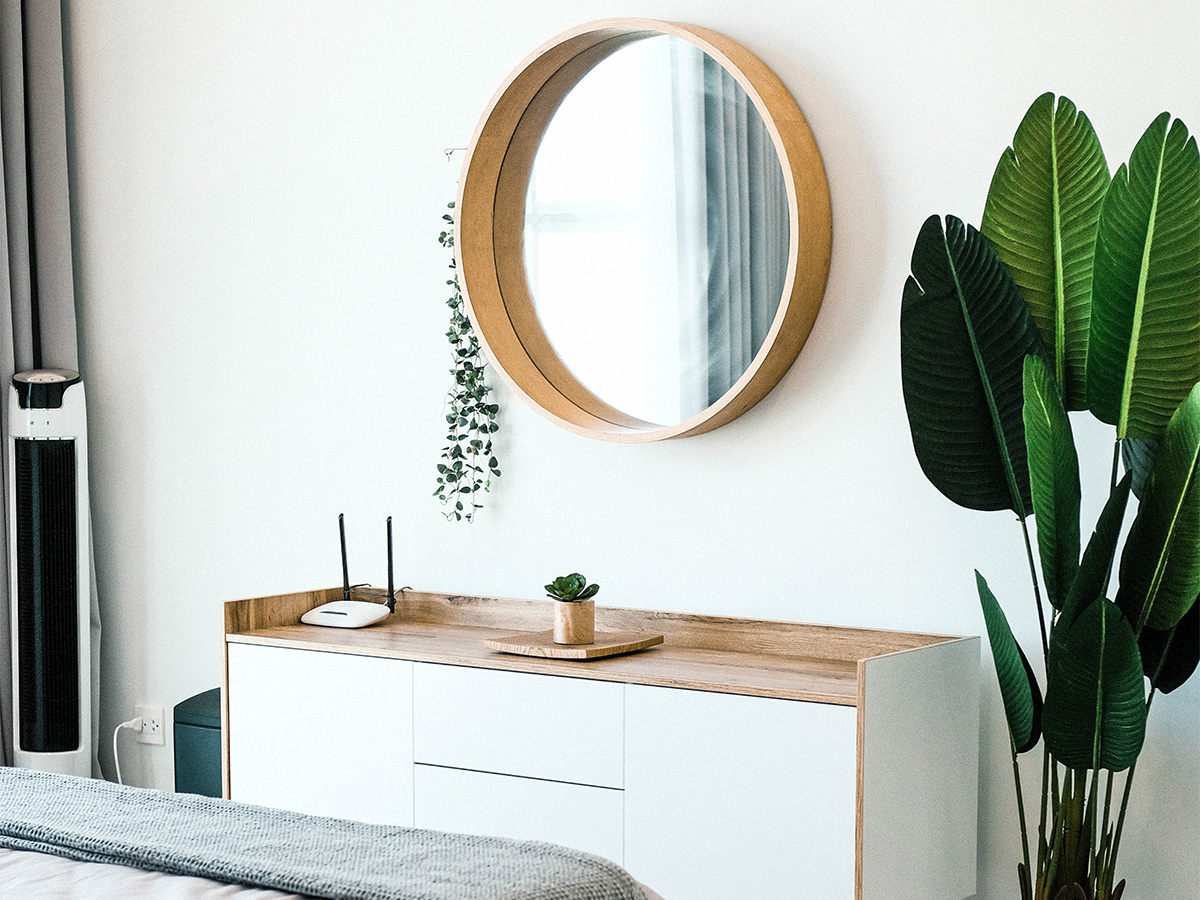 wood trim mirror on wall